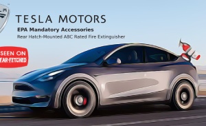 Image presents a picture of a Tesla model electric vehicle with an ABC rated fire extinguisher on the rear hatch because it is an EPA mandatory accessory.